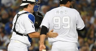 Los Angeles Dodgers catcher Will Smith has a mound visit with Hyun-Jin Ryu