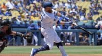 Los Angeles Dodgers third baseman Justin Turner hits a home run against the Arizona Diamondbacks