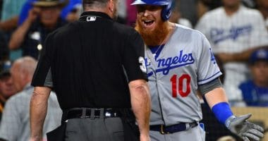 Los Angeles Dodgers third baseman Justin Turner argues with umpire Rob Drake