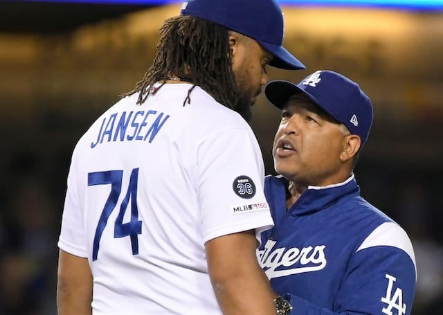Los Angeles Dodgers manager Dave Roberts speaks with Kenley Jansen