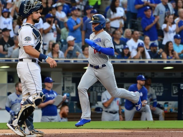 Los Angeles Dodgers utility player Kiké Hernandez scores a run against the San Diego Padres