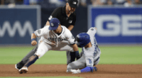 Los Angeles Dodgers utility player Kiké Hernandez steals second base against the San Diego Padres