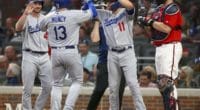 Los Angeles Dodgers teammates Kyle Garlick, Max Muncy and A.J. Pollock celebrate after a home run