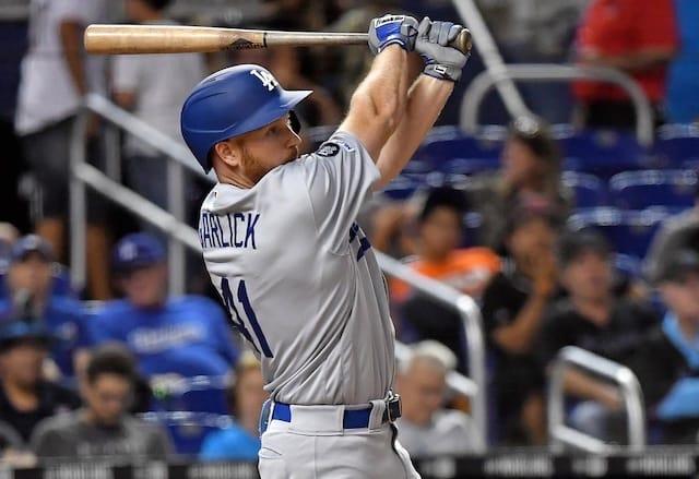 Los Angeles Dodgers outfielder Kyle Garlick hits a double against the Miami Marlins