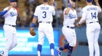 Matt Beaty, Kiké Hernandez, A.J. Pollock and Chris Taylor celebrate after a Los Angeles Dodgers win