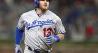 Los Angeles Dodgers infielder Max Muncy rounds the bases after hitting a home run