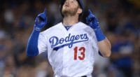 Los Angeles Dodgers infielder Max Muncy reacts after hitting a home run