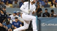 Los Angeles Dodgers infielder Max Muncy hits a single against the New York Yankees