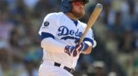 Los Angeles Dodgers infielder Max Muncy hits a home run against the San Diego Padres