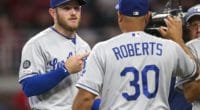 Los Angeles Dodgers manager Dave Roberts and Max Muncy celebrate after a win