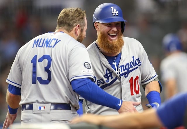 Los Angeles Dodgers teammates Max Muncy and Justin Turner celebrate after hitting back-to-back home runs