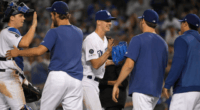 Walker Buehler, Rich Hill, Clayton Kershaw, Hyun-Jin Ryu and Will Smith celebrate after a Los Angeles Dodgers win
