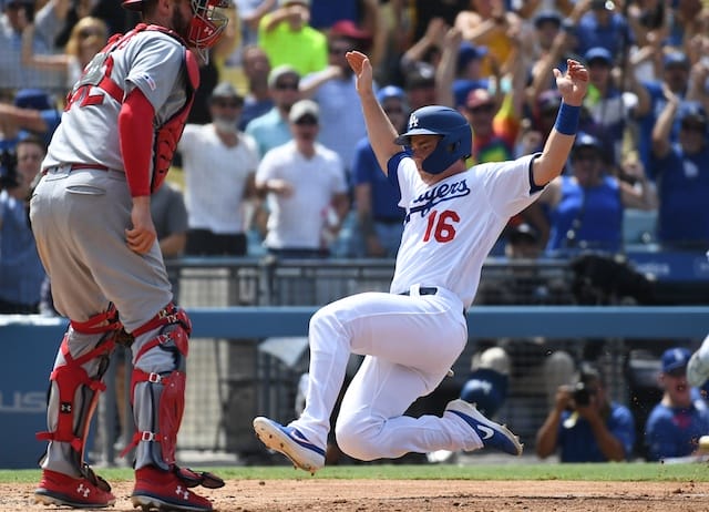 Los Angeles Dodgers catcher Will Smith scores the game-winning run against the St. Louis Cardinals