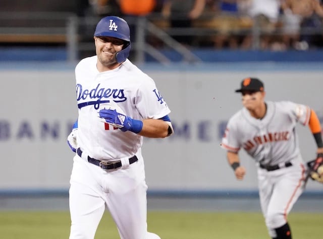 Los Angeles Dodgers outfielder A.J. Pollock rounds the bases after hitting a home run against the San Francisco Giants