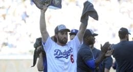 Los Angeles Dodgers utility player Charlie Culberson celebrates after hitting a walk-off home run to clinch the NL West