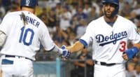 Los Angeles Dodgers teammates Chris Taylor and Justin Turner celebrate