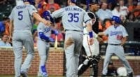 Los Angeles Dodgers teammates Cody Bellinger and Corey Seager celebrate after scoring