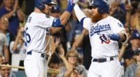 Los Angeles Dodgers teammates Cody Bellinger and Justin Turner celebrate after a home run