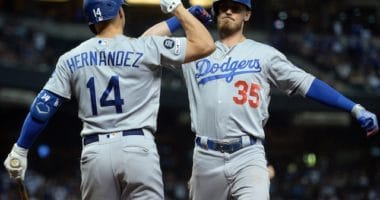 Los Angeles Dodgers teammates Cody Bellinger and Kiké Hernandez celebrate after a home run