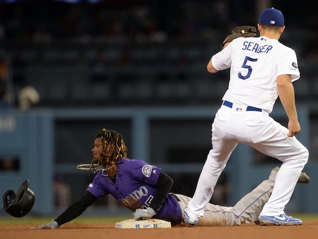 Los Angeles Dodgers shortstop Corey Seager receives a throw at second base