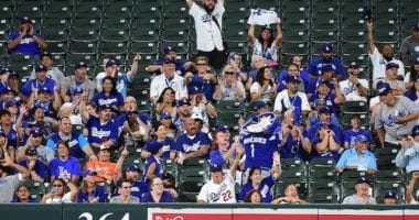Los Angeles Dodgers fans cheer during a game at Oriole Park at Camden Yards