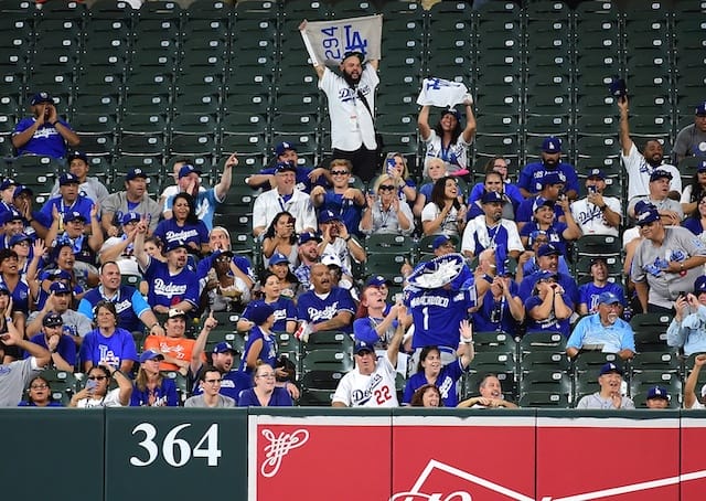 Los Angeles Dodgers fans cheer during a game at Oriole Park at Camden Yards