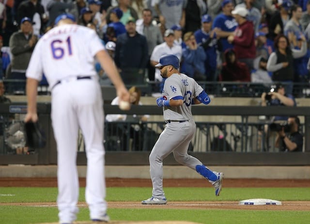 Los Angeles Dodgers infielder Edwin Rios rounds the bases after hitting a home run against the New York Mets