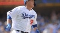 Los Angeles Dodgers starting pitcher Hyun-Jin Ryu rounds the bases after hitting a home run