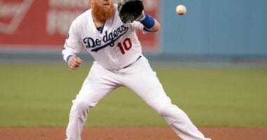 Los Angeles Dodgers third baseman Justin Turner fields a ball