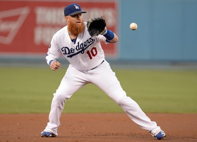 Los Angeles Dodgers third baseman Justin Turner fields a ball