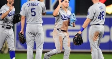 Los Angeles Dodgers teammates Kiké Hernandez, Gavin Lux, Corey Seager and Chris Taylor celebrate after a win