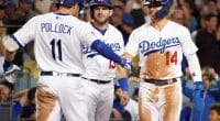 Los Angeles Dodgers teammates Kiké Hernandez, Max Muncy and A.J. Pollock celebrate after a home run