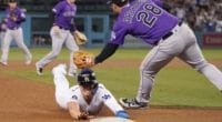 Los Angeles Dodgers utility player Kiké Hernandez slides into third base