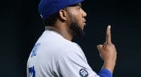 Los Angeles Dodgers relief pitcher Pedro Baez celebrates after his first career save