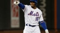 New York Mets outfielder Rajai Davis celebrates after a three-run double against the Los Angeles Dodgers