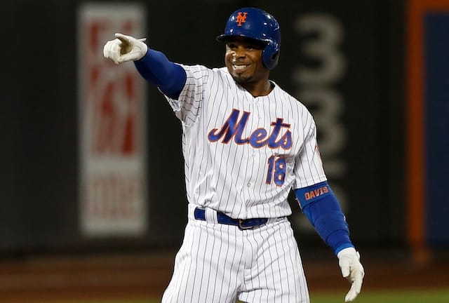 New York Mets outfielder Rajai Davis celebrates after a three-run double against the Los Angeles Dodgers