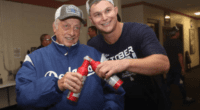 Former Los Angeles Dodgers manager Tommy Lasorda with Joc Pederson to celebrate clinching the 2019 NL West