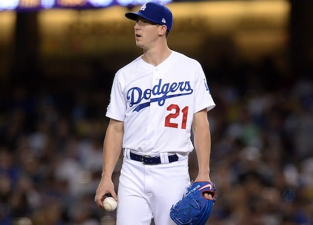 Los Angeles Dodgers pitcher Walker Buehler reacts during a start against the Colorado Rockies