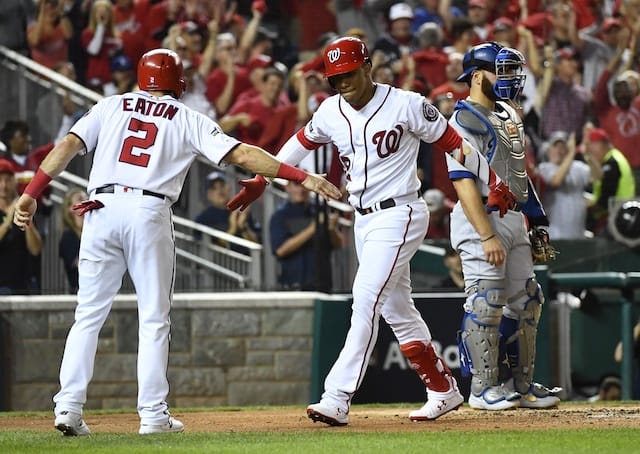 Washington Nationals teammates Adam Eaton and Juan Soto celebrate after a home run in Game 3 of the 2019 NLDS