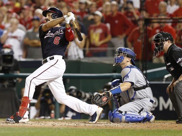 Washington Nationals third baseman Anthony Rendon hits a sacrifice fly during Game 4 of the 2019 NLDS