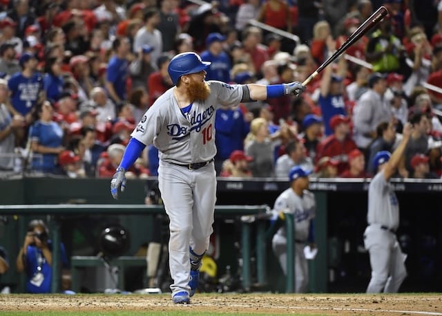 Los Angeles Dodgers third baseman Justin Turner watches his home run during Game 3 of the 2019 NLDS