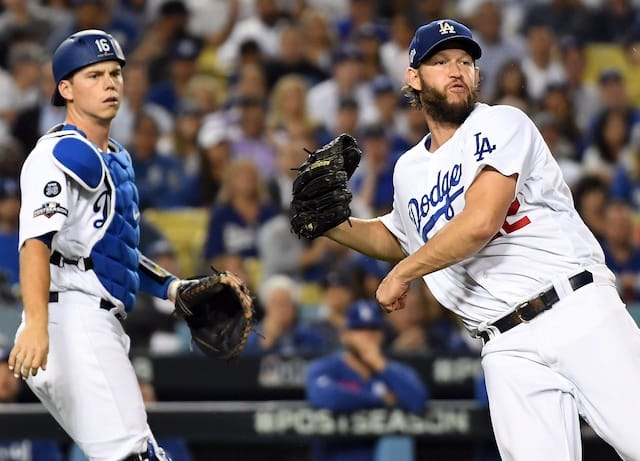 Los Angeles Dodgers starting pitcher Clayton Kershaw throws to first base during Game 2 of the 2019 NLDS