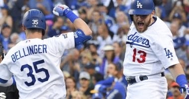 Los Angeles Dodgers teammates Cody Bellinger and Max Muncy celebrate after a home run during Game 5 of the 2019 NLDS