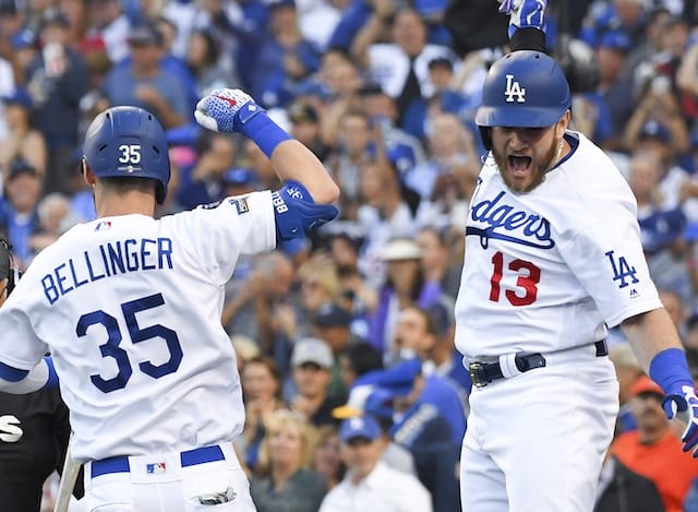 Los Angeles Dodgers teammates Cody Bellinger and Max Muncy celebrate after a home run during Game 5 of the 2019 NLDS