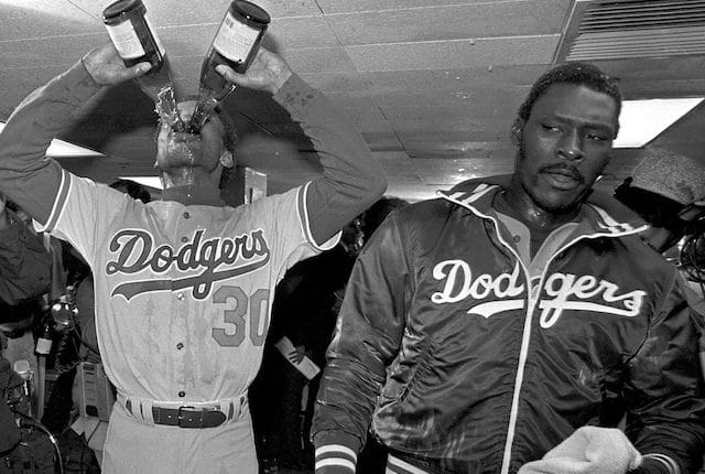 Los Angeles Dodgers teammates Dave Stewart and Derrel Thomas celebrate after defeating the New York Yankees in the 1981 world series