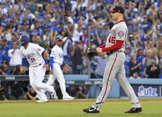 Los Angeles Dodgers outfielder A.J. Pollock scores during Game 1 of the 2019 NLDS