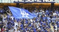 Los Angeles Dodgers fans with rally towels and a flag for the 2019 NLDS