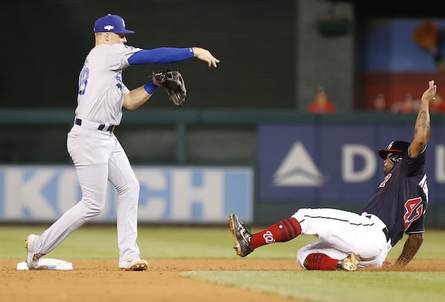 Los Angeles Dodgers infielder Gavin Lux throws to first base during Game 4 of the 2019 NLDS