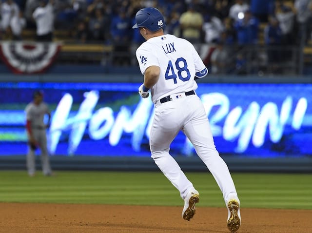 Los Angeles Dodgers infielder Gavin Lux rounds the bases after hitting a home run in Game 1 of the 2019 NLDS