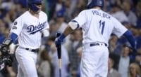 Los Angeles Dodgers teammates Gavin Lux and A.J. Pollock celebrate during Game 1 of the 2019 NLDS